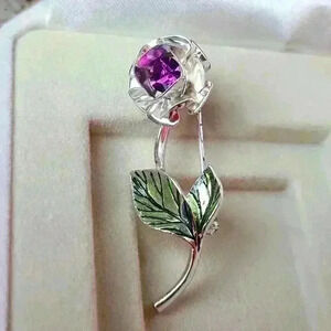 Avon birthstone February amethyst flower with green leaves silver tone brooch